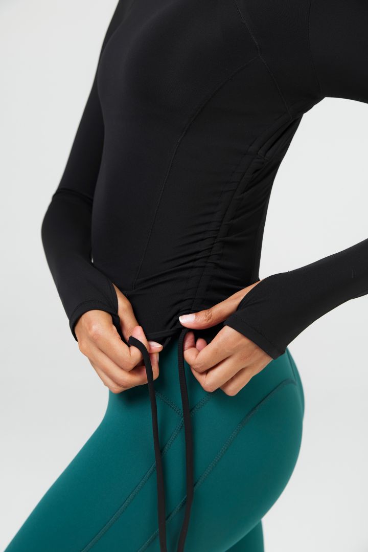 Hauts de yoga à manches longues avec trou pour le pouce