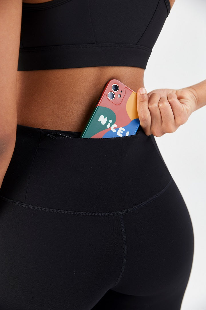 Short motard taille haute avec poche zippée invisible