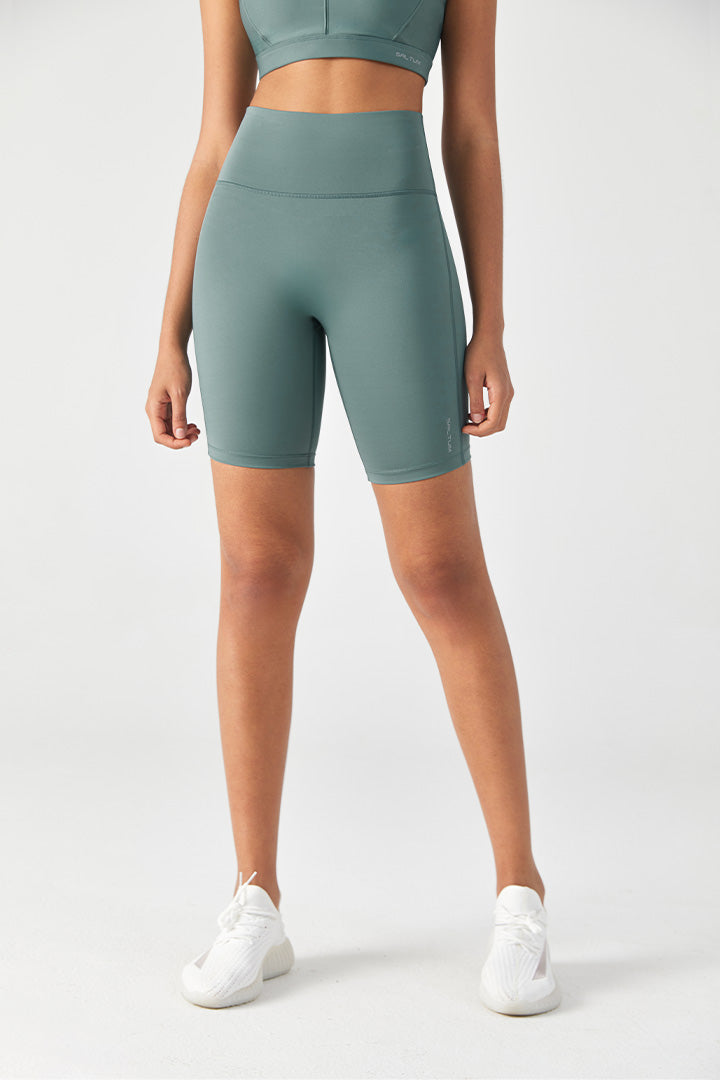 Short motard taille haute avec poche zippée invisible
